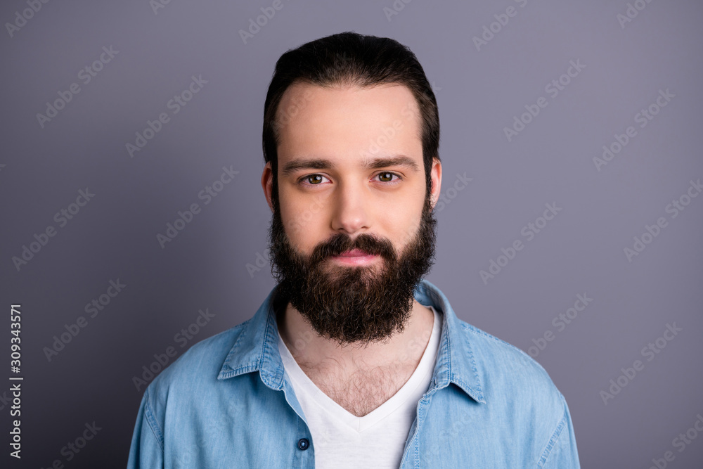 Closeup photo of amazing macho guy serious perfect appearance neat long hairdo bristle young promoted boss chief wear casual denim outfit isolated grey color background Closeup photo of amazing macho guy serious perfect appearance neat long hairdo bristle young promoted boss chief wear casual denim outfit isolated grey color background