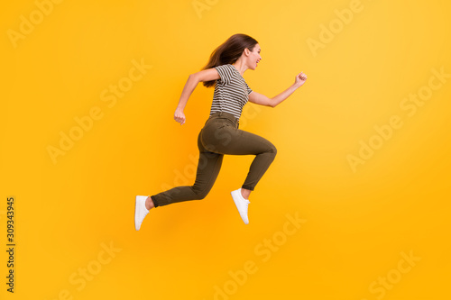 Full length profile side photo of funky funny crazy girl jump run after black friday bargains wear good looking clothes isolated over shine color background