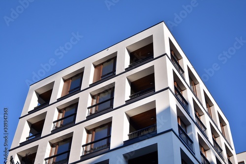 Modern and new apartment building. Multistoried modern, new and stylish living block of flats.