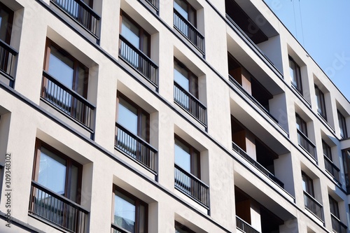 Modern and new apartment building. Multistoried modern, new and stylish living block of flats.