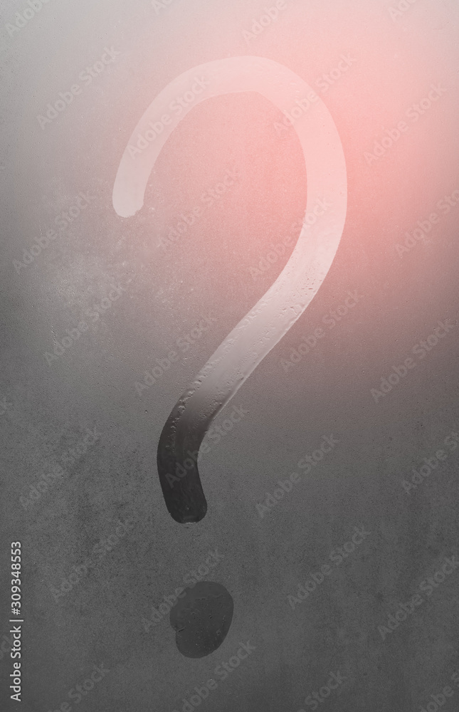 Inscription question mark on the sweaty glass. question mark drawn on a ...