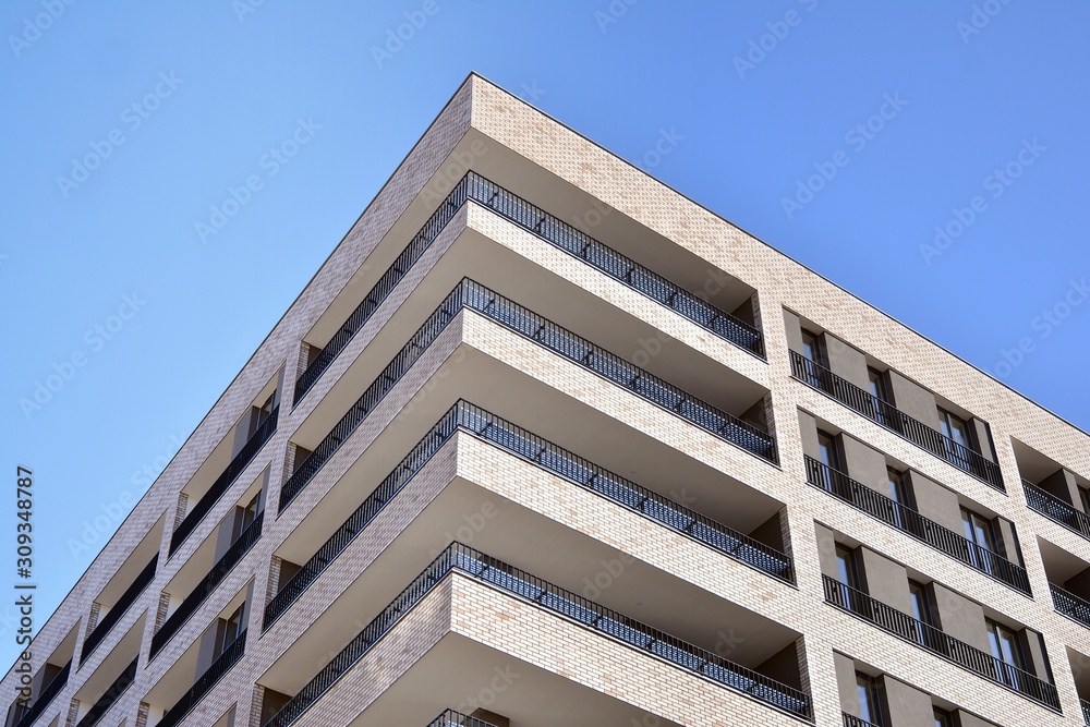 Modern and new apartment building. Multistoried modern, new and stylish living block of flats.