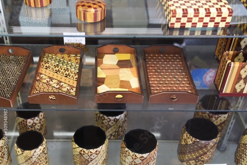 Hakone Yosegi Zaiku is a traditional Japanese craft that combines various pieces of wood the create geometric patterns. photo