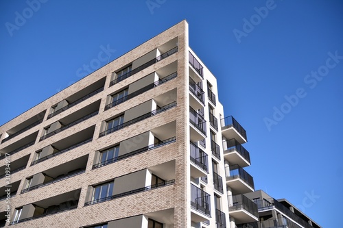 Modern and new apartment building. Multistoried modern, new and stylish living block of flats. © Grand Warszawski