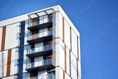 Modern and new apartment building. Multistoried modern, new and stylish living block of flats.