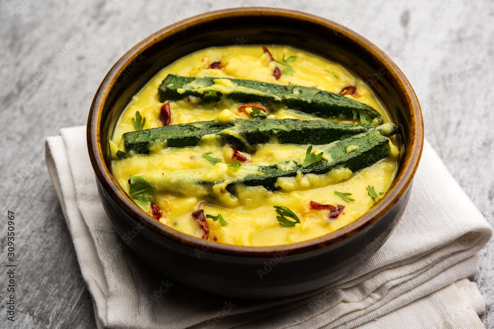 Dahi Bhindi or Okra in Yogurt Gravy, served in a bowl or karahi, selective focus Dahi Bhindi or Okra in Yogurt Gravy, served in a bowl or karahi, selective focus