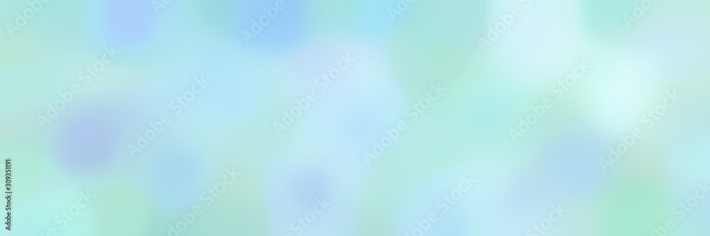 blurred horizontal background with powder blue, light cyan and pale turquoise colors and space for text or image