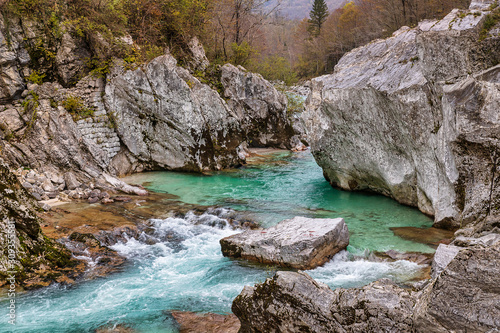 Rocky canyon and clear emerald waters of Soca river in Slovenia