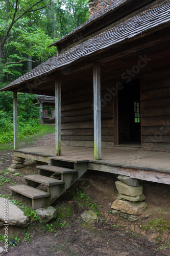 Fotografie, Tablou An old worn cabin porch in the southern appalachian mountains..
