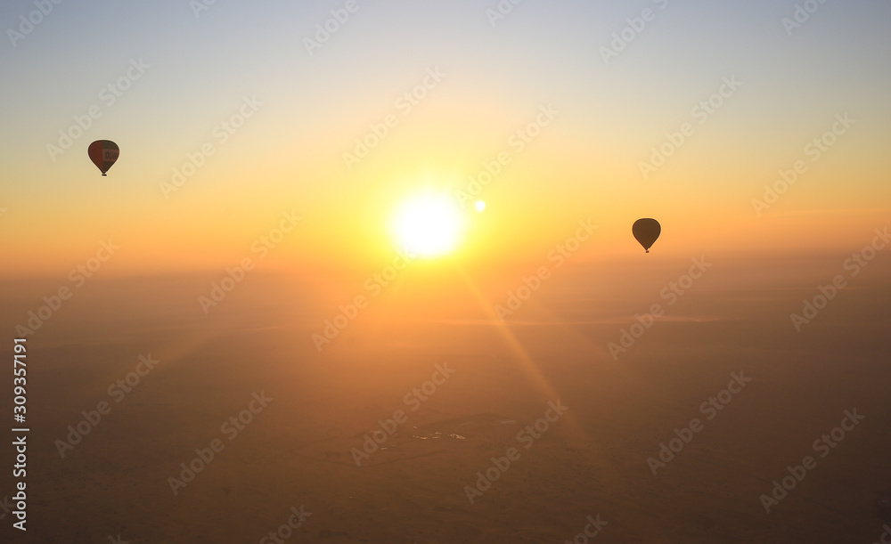 morning with balloons at dawn