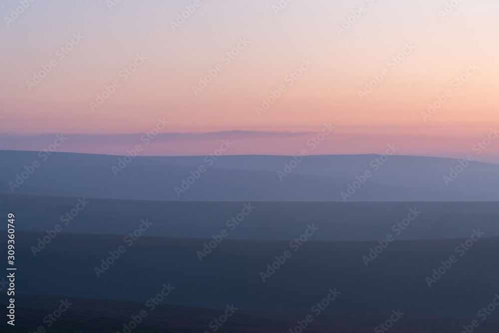 the orange skies of a misty Exmoor catching the last glow just after sunset