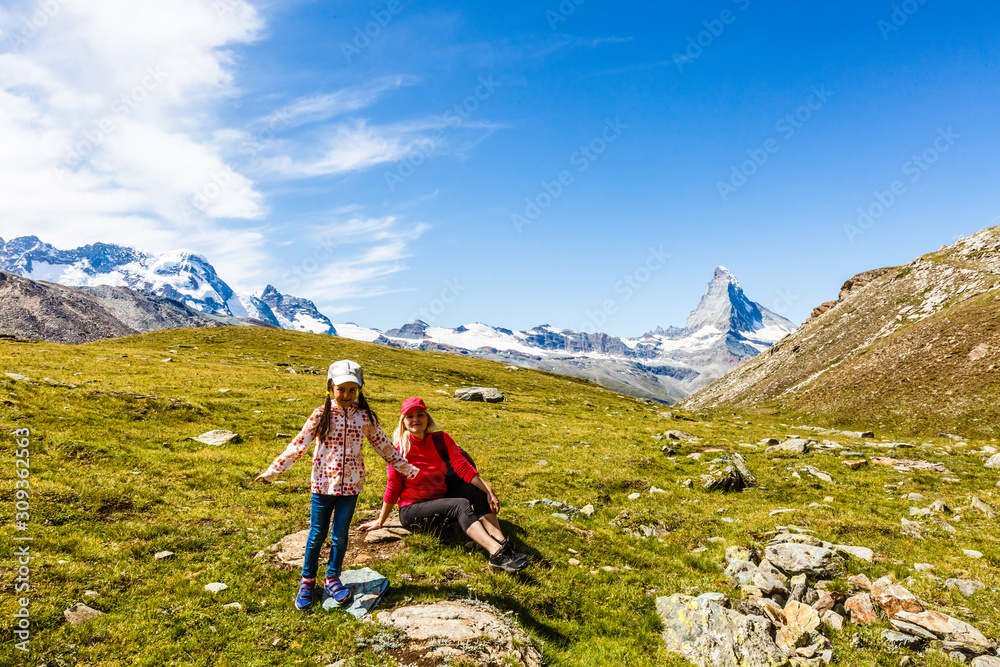 Fototapeta premium Family trekking, mother and daughter camping