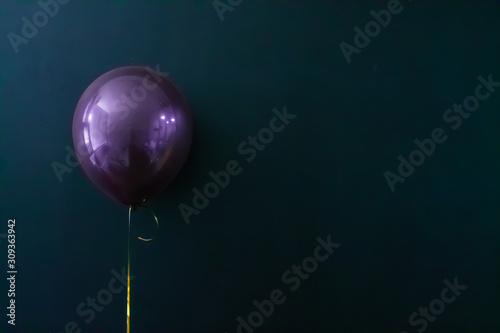 purple air balloon on a dark background. Holiday Concept, Postcard