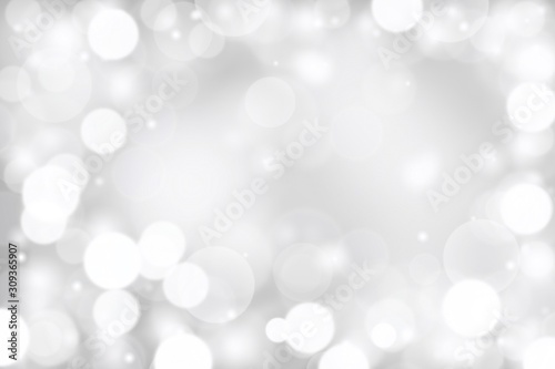Gray abstract background. white bokeh and snowflakes blurred beautiful shiny lights. use for Merry Christmas /happy new year wallpaper backdrop and your product.