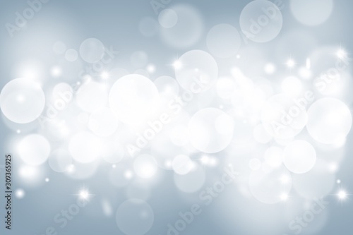 Blue gray abstract background. white bokeh and snowflakes blurred beautiful shiny lights. use for Merry Christmas /happy new year wallpaper backdrop and your product.