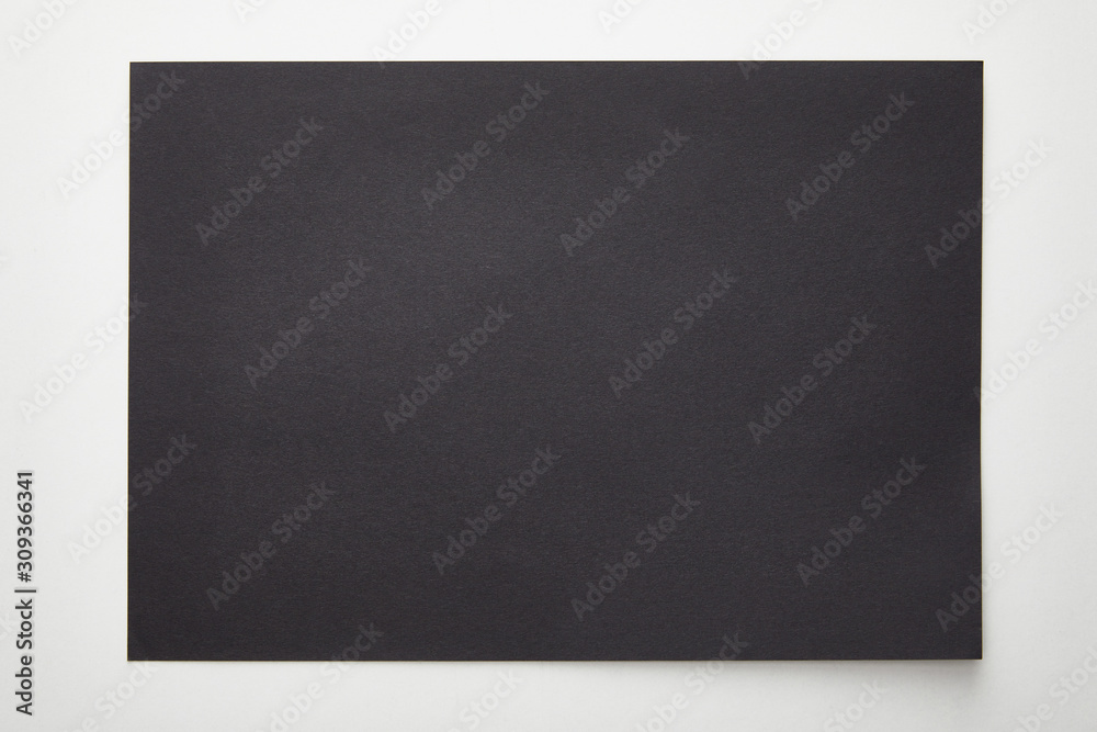 top view of empty black paper on white background top view of empty black paper on white background