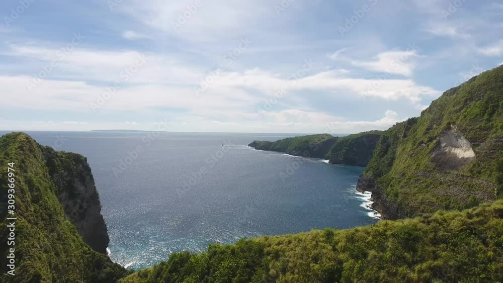 Stunning tropical view, huge cliffs along the coastline, ocean and mountains, 4k Stunning tropical view, huge cliffs along the coastline, ocean and mountains, 4k