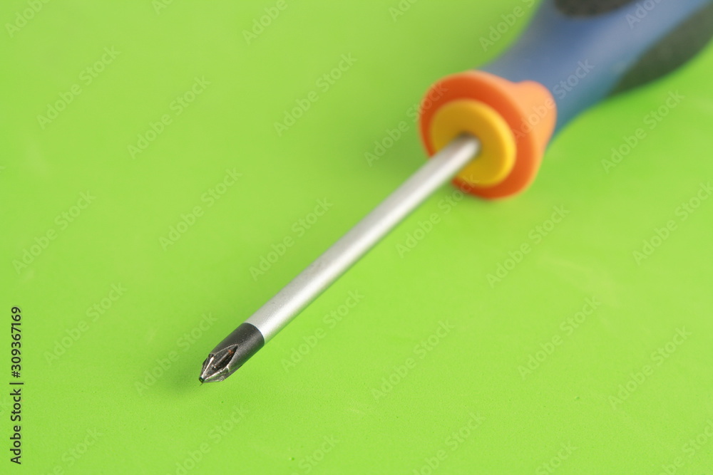 screwdriver tipped star, orange blue and black screwdriver tipped star, orange blue and black