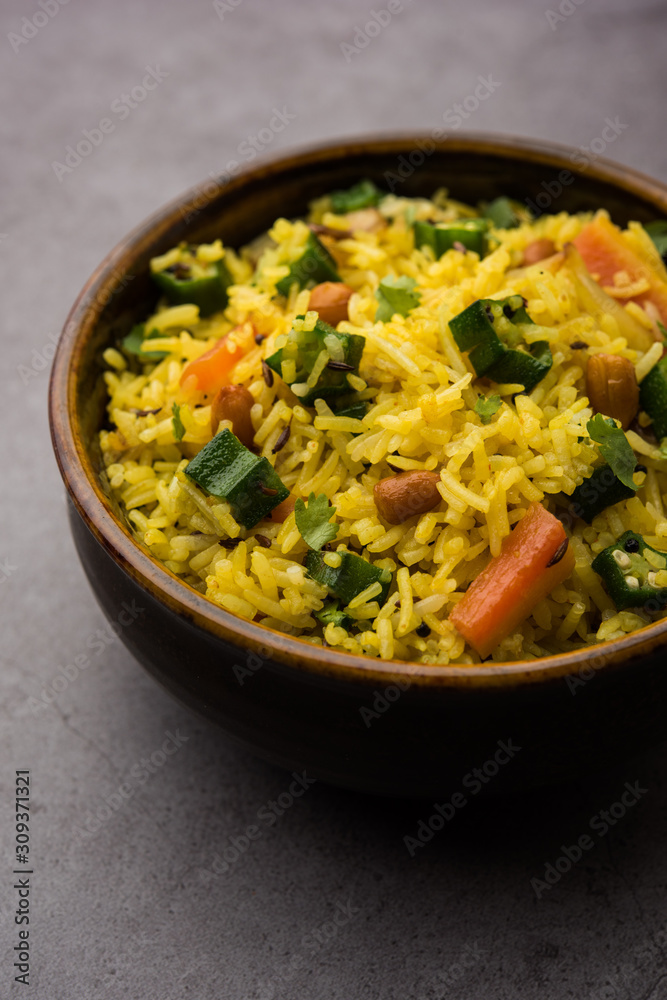 Okra or Bhindi rice also known as Vendakkai Sadam, served in a bowl, selective focus