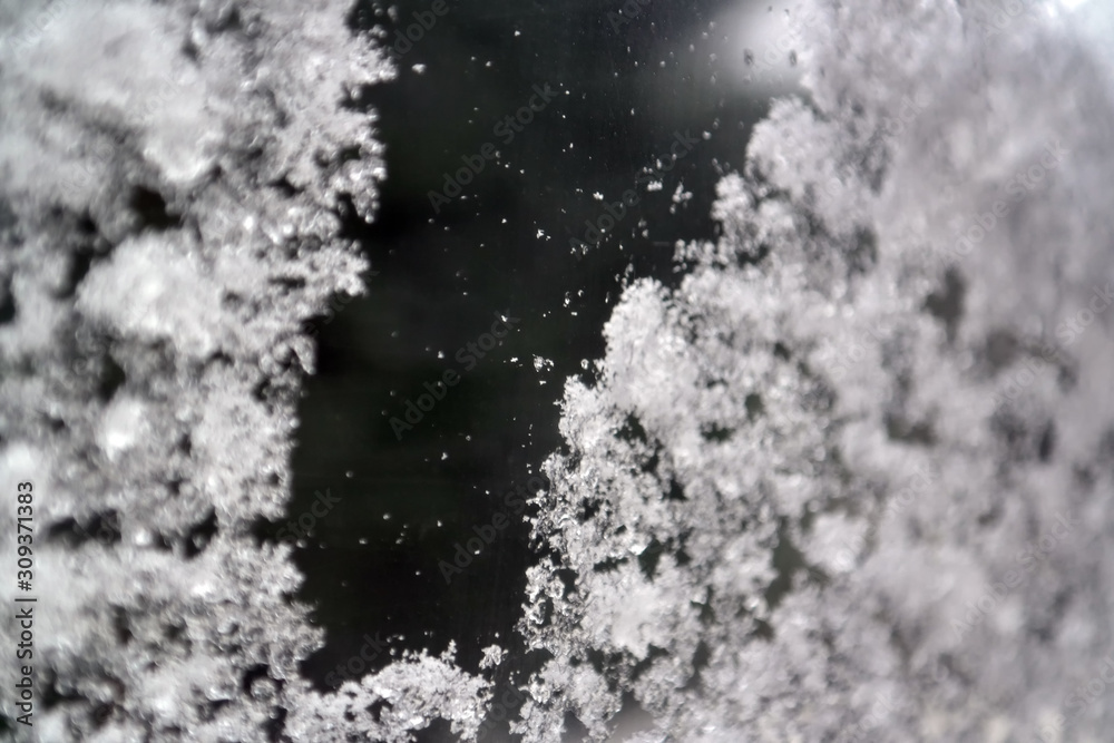 Snowflake on window, Snowflake on glass. winter time. 