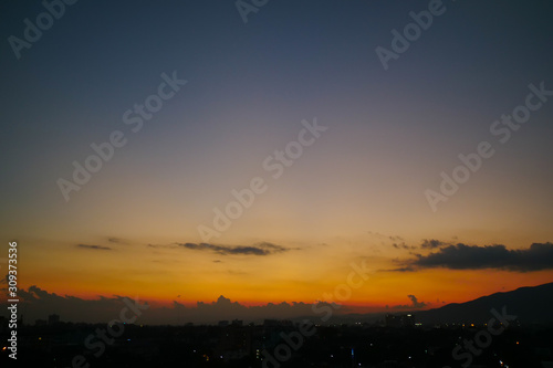 dramatic dusk sky above the town