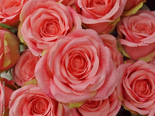 Macro of a bundle of artificial pink roses