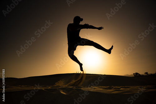 Jumping Sihlouette During Sunset