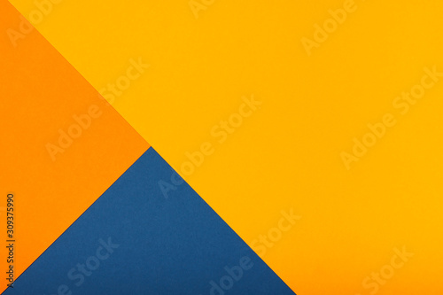 Abstract geometric paper background. Trendy blue and orange colors  active lines.