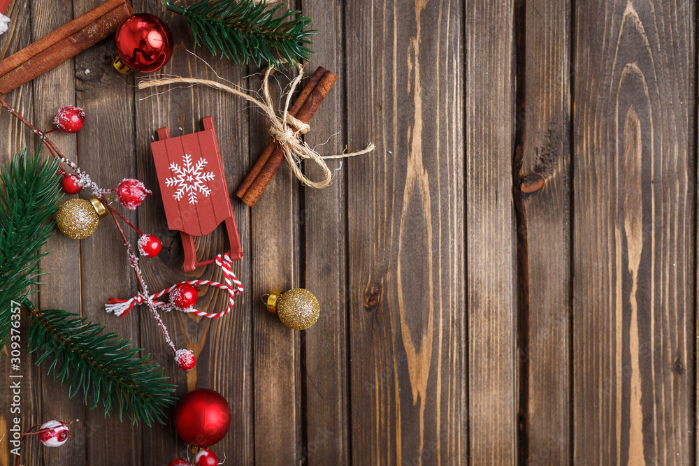 Brown wooden background with festive Christmas decoration, copy space Brown wooden background with festive Christmas decoration, copy space