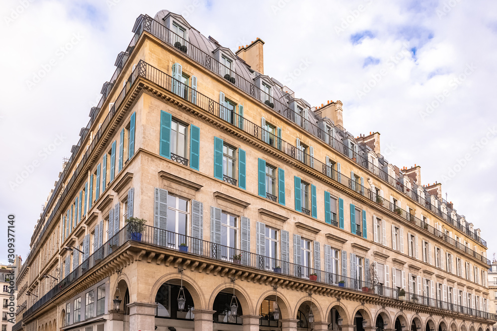 Paris, typical building, parisian facade and windows rue de Rivoli 