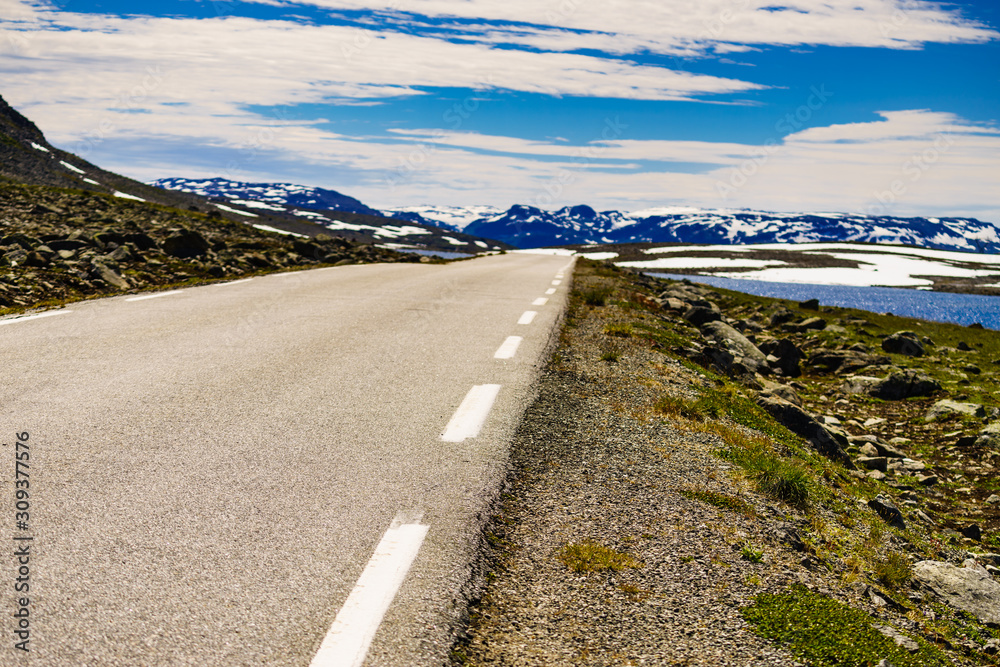 Asphalt road in norwegian mountains