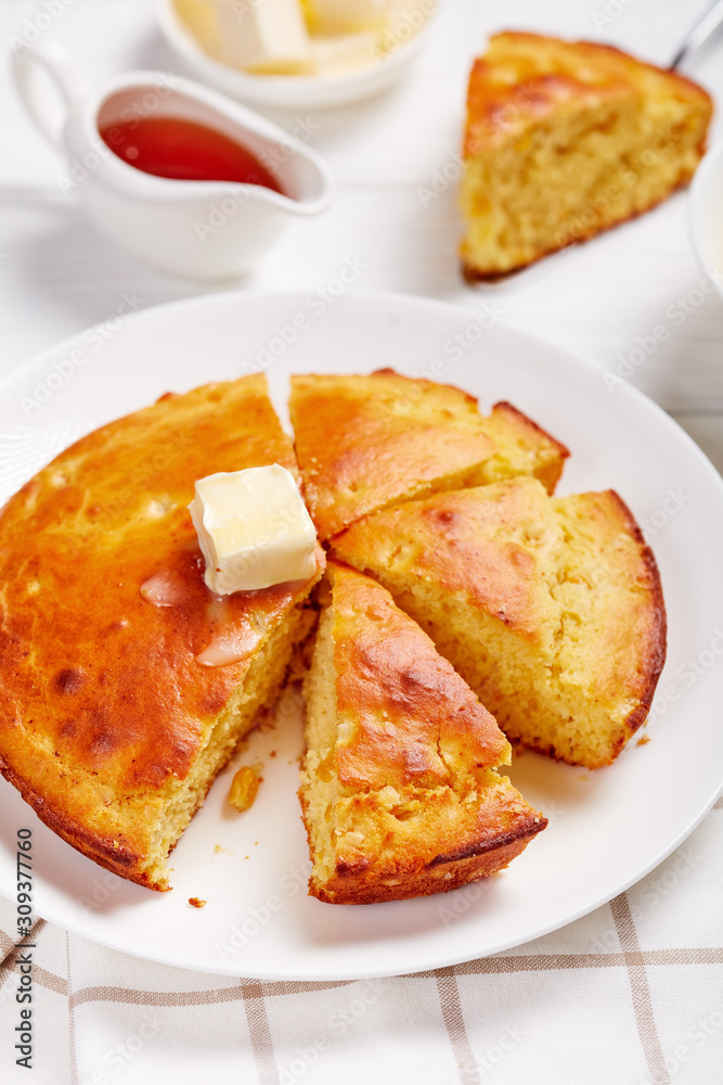 Cornbread on a white plate, top view Cornbread on a white plate, top view
