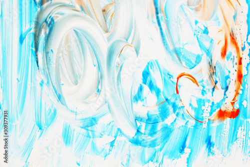 Abstract strokes of multicolored gouache on white paper for backgrounds