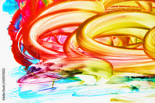 Abstract strokes of multicolored gouache on white paper for backgrounds