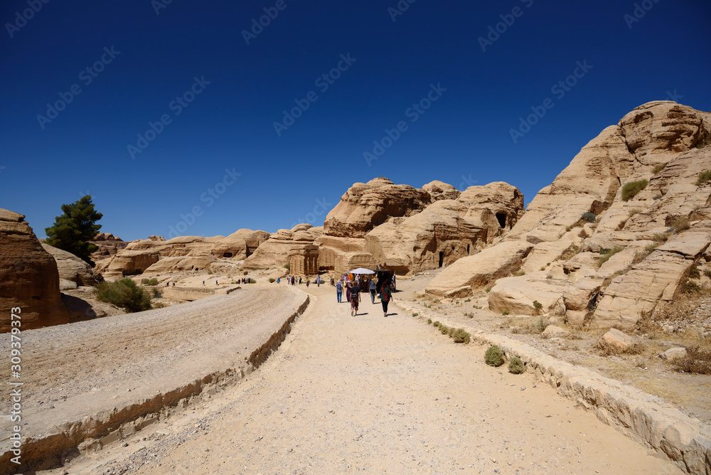 As-Siq canyon, ancient entrance leading to the UNESCO World Heritage site of Petra in Jordan As-Siq canyon, ancient entrance leading to the UNESCO World Heritage site of Petra in Jordan