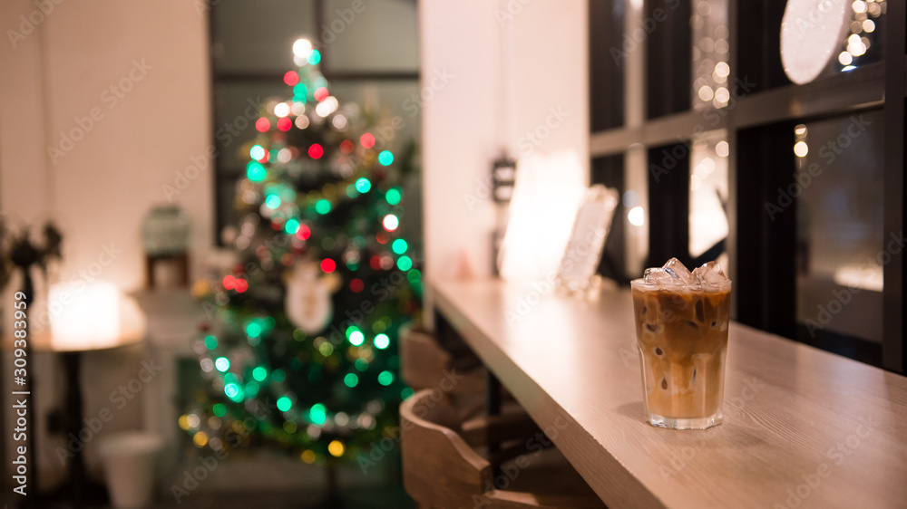 ice latte coffee in plastic cup put on wooden table, christmas theme background ice latte coffee in plastic cup put on wooden table, christmas theme background
