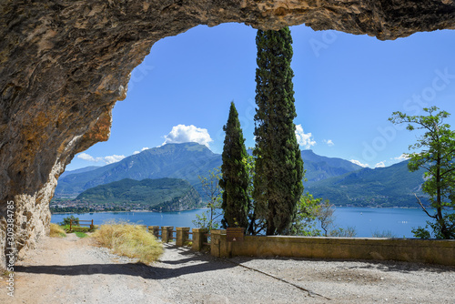 tourist attraction above garda lake, old ponale road trail under overhanging rocks