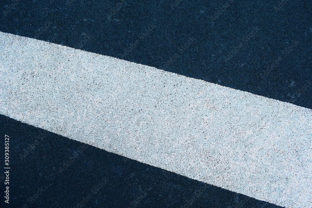 Fototapeta premium Blue and white grainy texture. White strip on a blue background