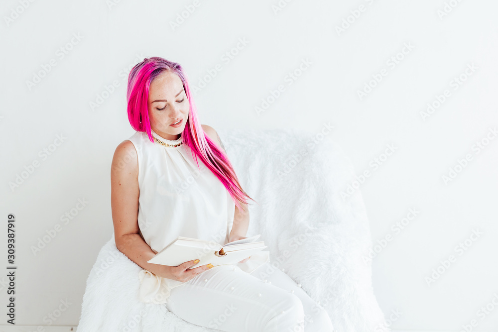 beautiful girl with pink hair reads the book education beautiful girl with pink hair reads the book education