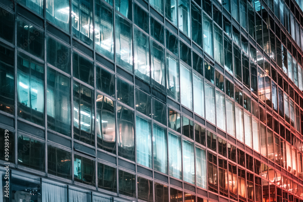 office building facade at night - business district office building facade at night - business district