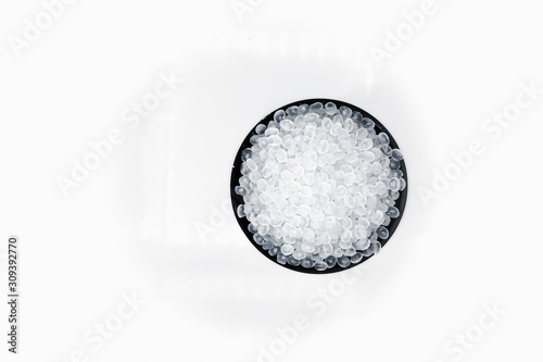 Polypropylene granule close-up background texture.