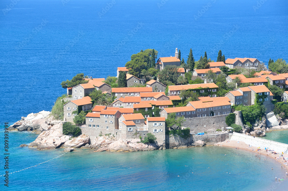The nice island of Sveti Stefan (Sveti Stephan) in the Adriatic sea in the summer. Montenegro