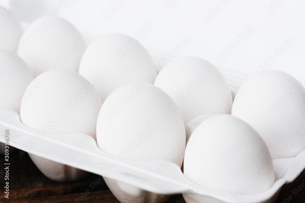 Fresh white chicken eggs in a package Fresh white chicken eggs in a package