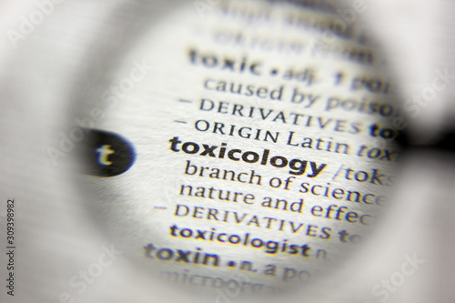 The word or phrase Toxicology in a dictionary. photo