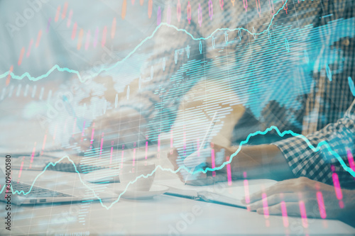 Wallpaper Mural Multi exposure of forex chart with man working on computer on background. Concept of market analysis. Torontodigital.ca
