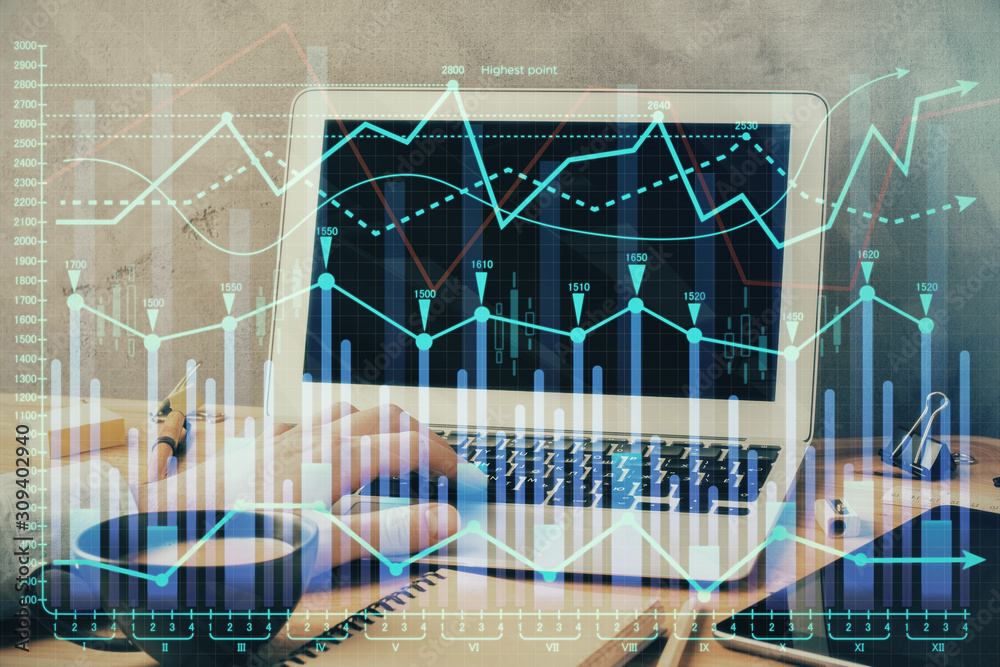 Forex graph with businessman working on computer in office on background. Concept of hardworking. Double exposure. Forex graph with businessman working on computer in office on background. Concept of hardworking. Double exposure.