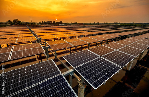 Aerial outdoor solar photovoltaic base in Asia under sunset