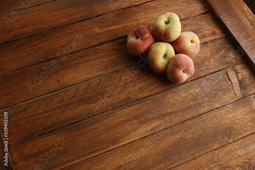 Paraguayan peach on wooden background