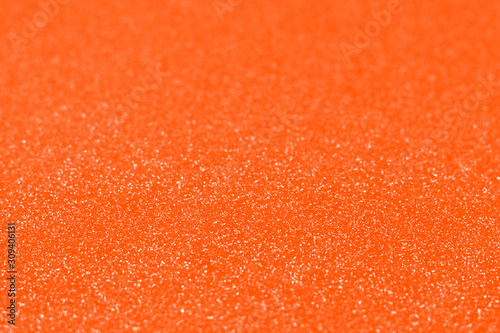 Trendy orange color abstract background. Sparkling and shine monochrome Lush Lava backdrop.