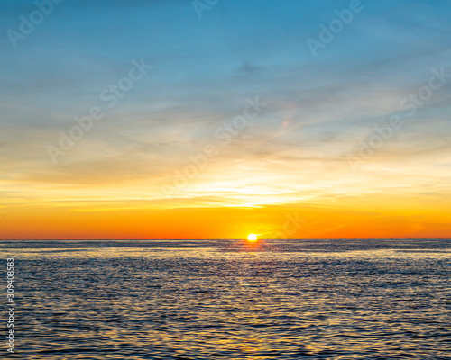 A tropical sunset over the Atlantic Ocean from Grand Bahama, Bahamas 